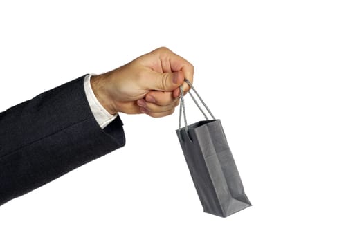 Close-up of a businessman holding a shopping bag