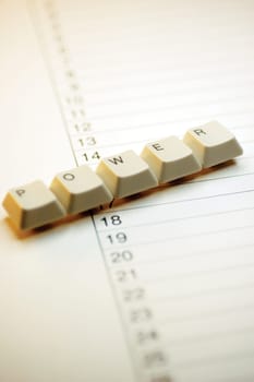 Close-up of computer keys on a paper