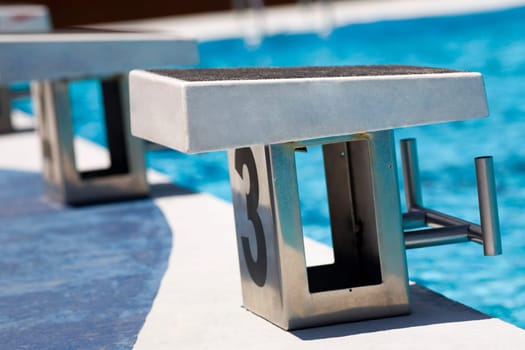 Close-up of diving platforms in a swimming pool
