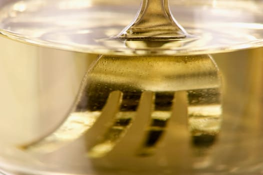 Close-up of a fork in water