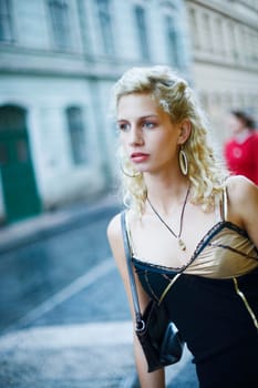 Close-up of a young woman walking on the street