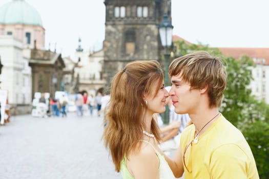 Side profile of a young couple face to face