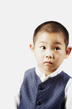 Close-up of a boy posing and looking away
