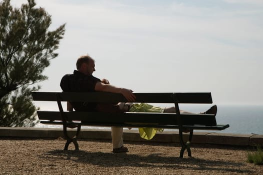 Couple on a bench, Biarritz, Basque Country, Pyrenees_Atlantiques, Aquitaine, France