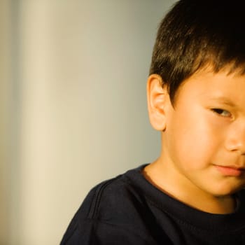 Close-up of a boy looking away