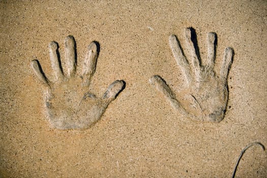 Close-up of handprints in cement at a theater, MannŽs Chinese Theater, Los Angeles, California, USA