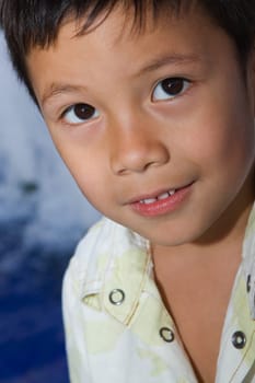 Portrait of a boy grinning