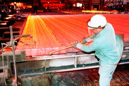 Manual worker working in a factory