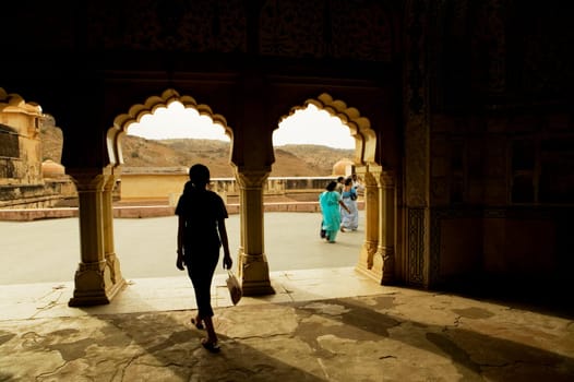 Woman standing inside a fort, Amber Fort, Jaipur, Rajasthan, India