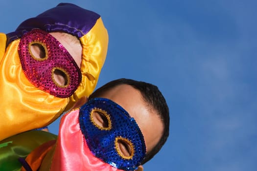 Close-up of two men wearing costumes