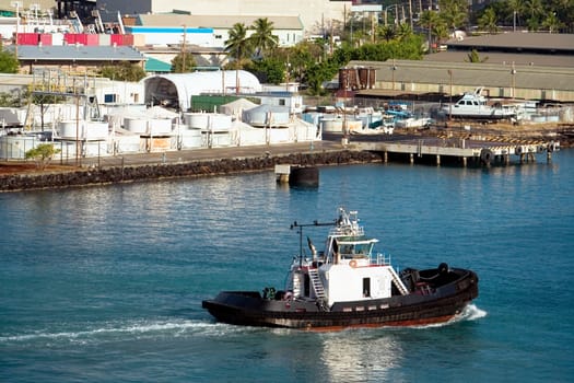 High angle view of a tugboat at a harbor, Honolulu Harbor, Honolulu, Oahu, Hawaii Islands, USA