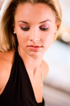 Close-up of a young woman looking down