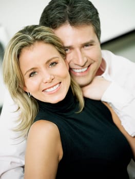 Portrait of a mid adult woman and a mature man smiling