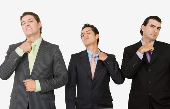 Portrait of three businessmen looking exhausted
