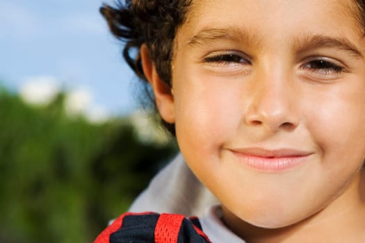 Portrait of a boy smirking