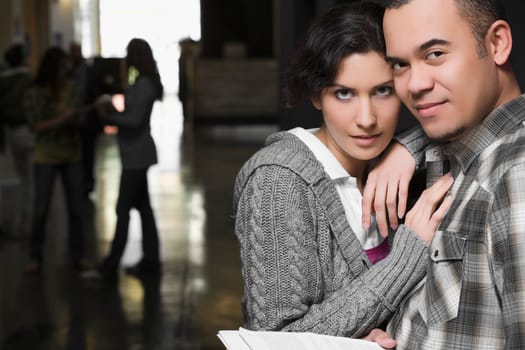 Portrait of a young couple in a corridor