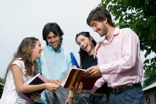 University students discussing and smiling