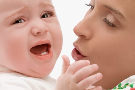 Close_up of a mid adult woman looking at her son