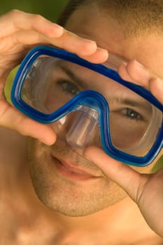 Portrait of a young man wearing a scuba mask