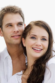 Close-up of a young couple smiling