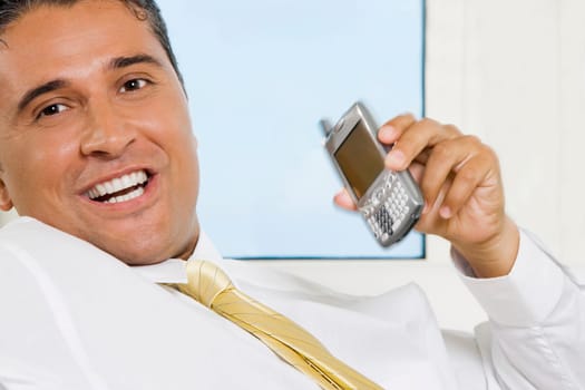 Close-up of a businessman using a mobile phone