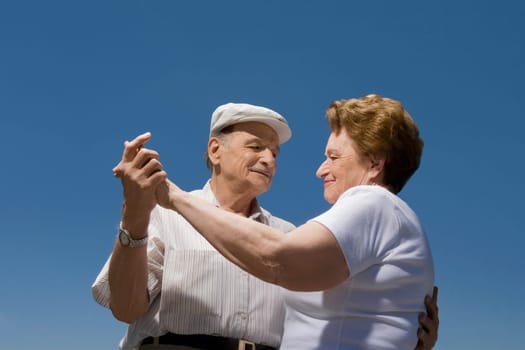 Low angle view of a senior couple dancing