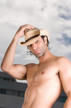 Portrait of a mid adult man wearing a hat