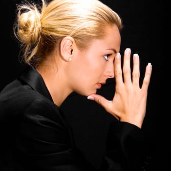 Side profile of a young woman thinking