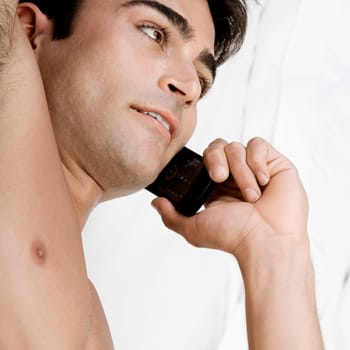 High angle view of a mid adult man talking on a mobile phone
