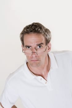 Portrait of a mid adult man frowning
