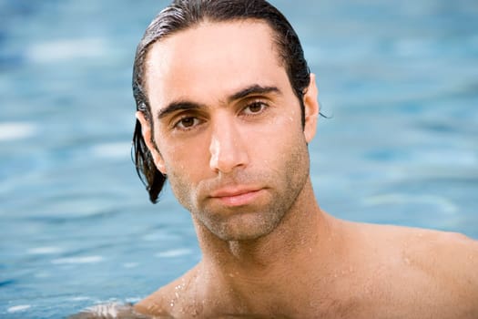 Portrait of a mid adult man in a swimming pool