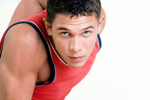 Portrait of a young man doing push-ups