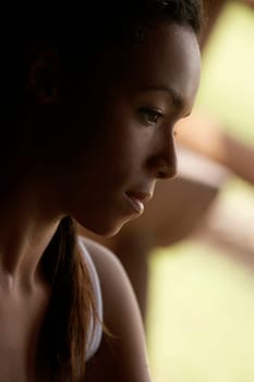 Close-up of a young woman looking serious