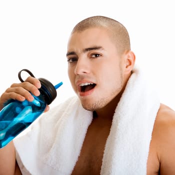 Portrait of a young man holding a water bottle