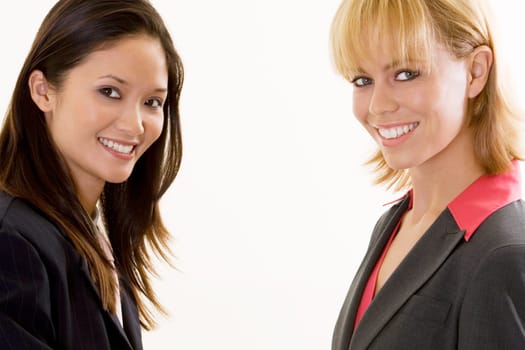 Portrait of two businesswomen smiling