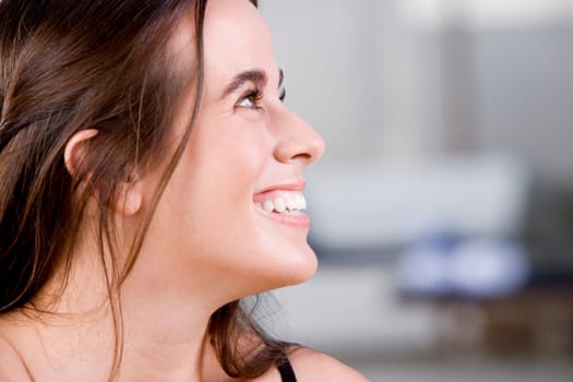 Close-up of a young woman smiling