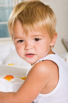 Close-up of a boy lying on the bed
