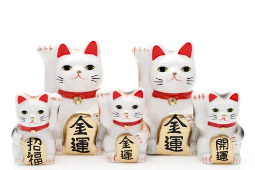 Japanese lucky cat on white background, Japanese word of this photography means "better fortune, blessing, economic fortune"""