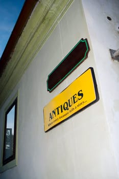 Low angle view of two sign boards on the wall, Czech Republic