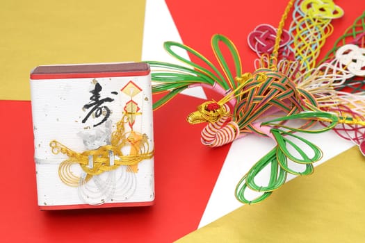 Japanese wedding gift, traditional custom. It is written "Kotobuki"" (meaning congratulations on marriage)"