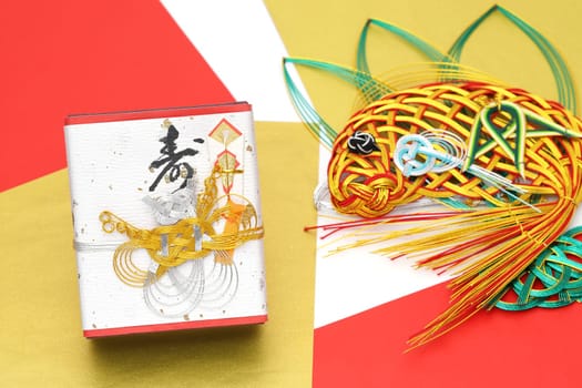 Japanese wedding gift, traditional custom. It is written "Kotobuki"" (meaning congratulations on marriage)"