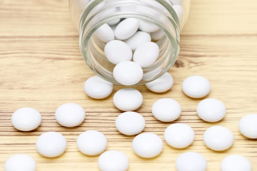 medical pills and glass bottle on a table, medical for health