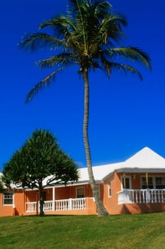 Front view of a man walking on a pavement, Grotto bay beach hotel, Bermuda