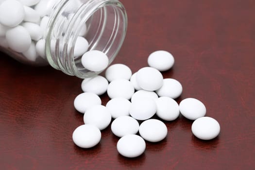 medical pills and glass bottle on a table, medical for health