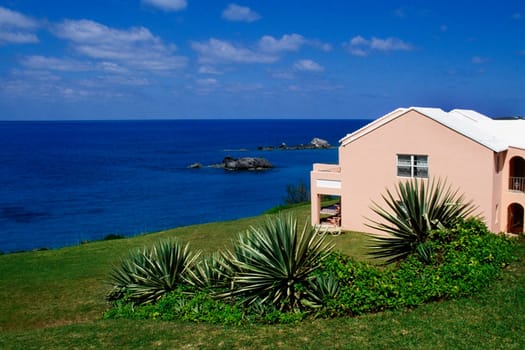 Side view of a pink building facing the ocean, Devonshire north shore, Bermuda