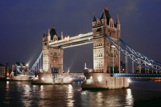 Low angle view of Tower bridge at night, London, England
