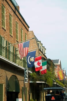 National flags on balconies of buildings, New Orleans, Louisiana, USA
