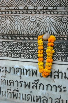 Close-up of a garland hanging on a wall, Nong Khai, Thailand