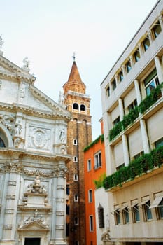 Low angle view of the bell tower and a church, Venice, Italy