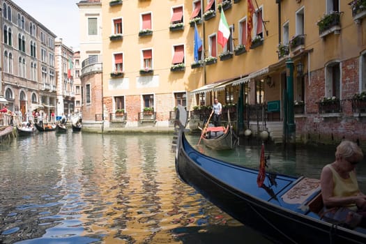 Gondolas in a canal, Venice, Italy